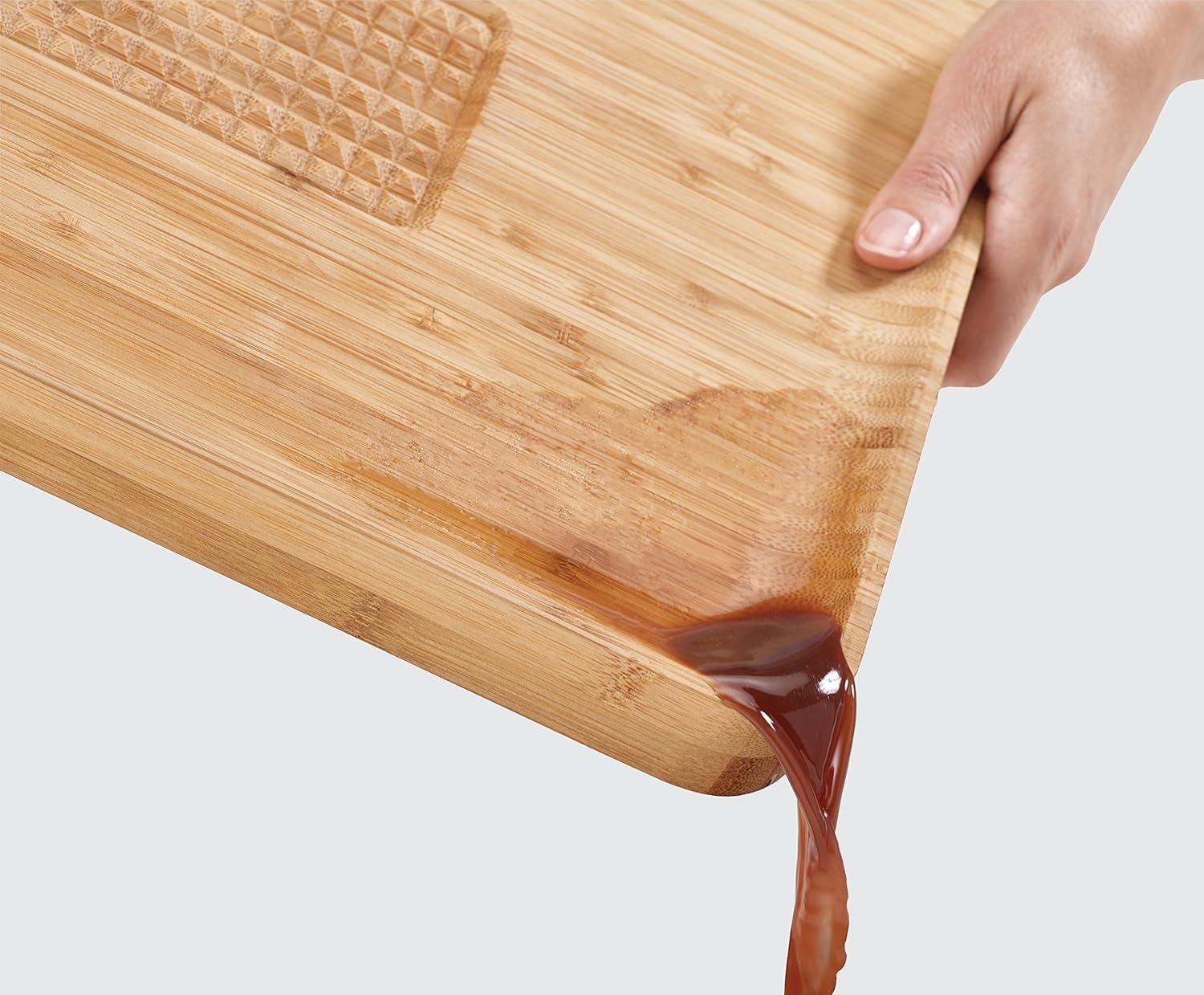 image:imageJoseph Joseph Cut amp Carve Bamboo Cutting Board with Food Grip and Angled Surface Yellow Large