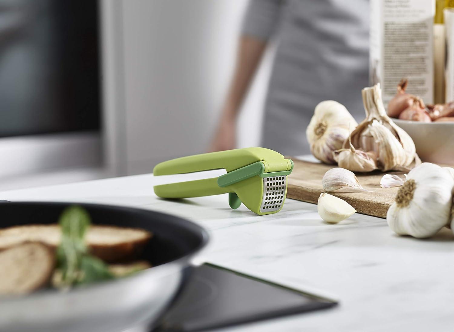 image:imageJoseph Joseph CleanForce Garlic Press Garlic Mincer with TriggerOperated Wiper Blade amp Handy Cleaning Tool Green